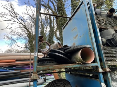 METAL STILLAGE TO INC. ASSORTED PIPE FITTINGS & MANHOLE LIDS