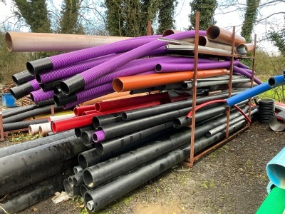 METAL STORAGE RACK TO INC. ASSORTED PIPES & CONCRETE JOINTS
