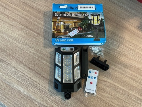 UNUSED OUTDOOR LED SOLAR LIGHT C/W REMOTE