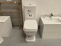 FULLY ENCLOSED TOILET INCLUDING PAN, CISTERN AND SEAT