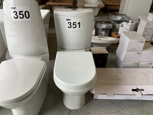 FULLY ENCLOSED TOILET PAN, CISTERN, AND SEAT