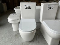 FULLY ENCLOSED TOILET WITH PAN, CISTERN, AND SEAT