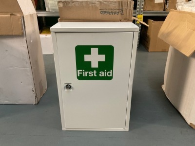 UNUSED FIRST AID METAL STORAGE CABINET