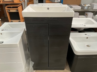 APPROX. 500 FLOOR-STANDING TWO-DOOR UNIT IN BLACK WOODGRAIN WITH BASIN