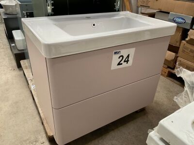 APPROX. 800 WALL-MOUNTED PALE PINK UNIT WITH BASIN