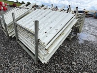GALVANISED METAL STILLAGE & APPROX. 7No. SOLID METAL TEMPORARY FENCING PANELS