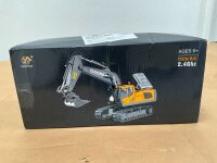 UNUSED TOY EXCAVATOR