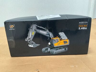 UNUSED TOY EXCAVATOR