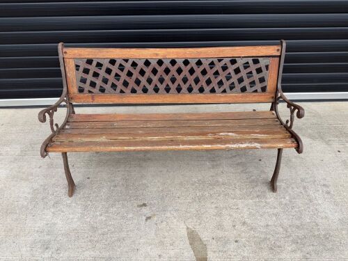 TWO SEATER OUTDOOR WOODEN BENCH WITH CAST IRON SIDES