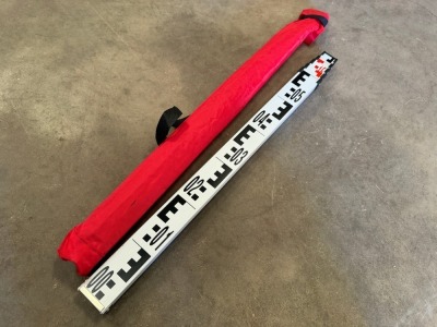 UNUSED MEASURING STAFF