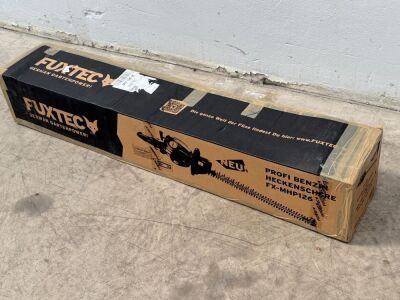 UNUSED FUXTEC PETROL HEDGE TRIMMER